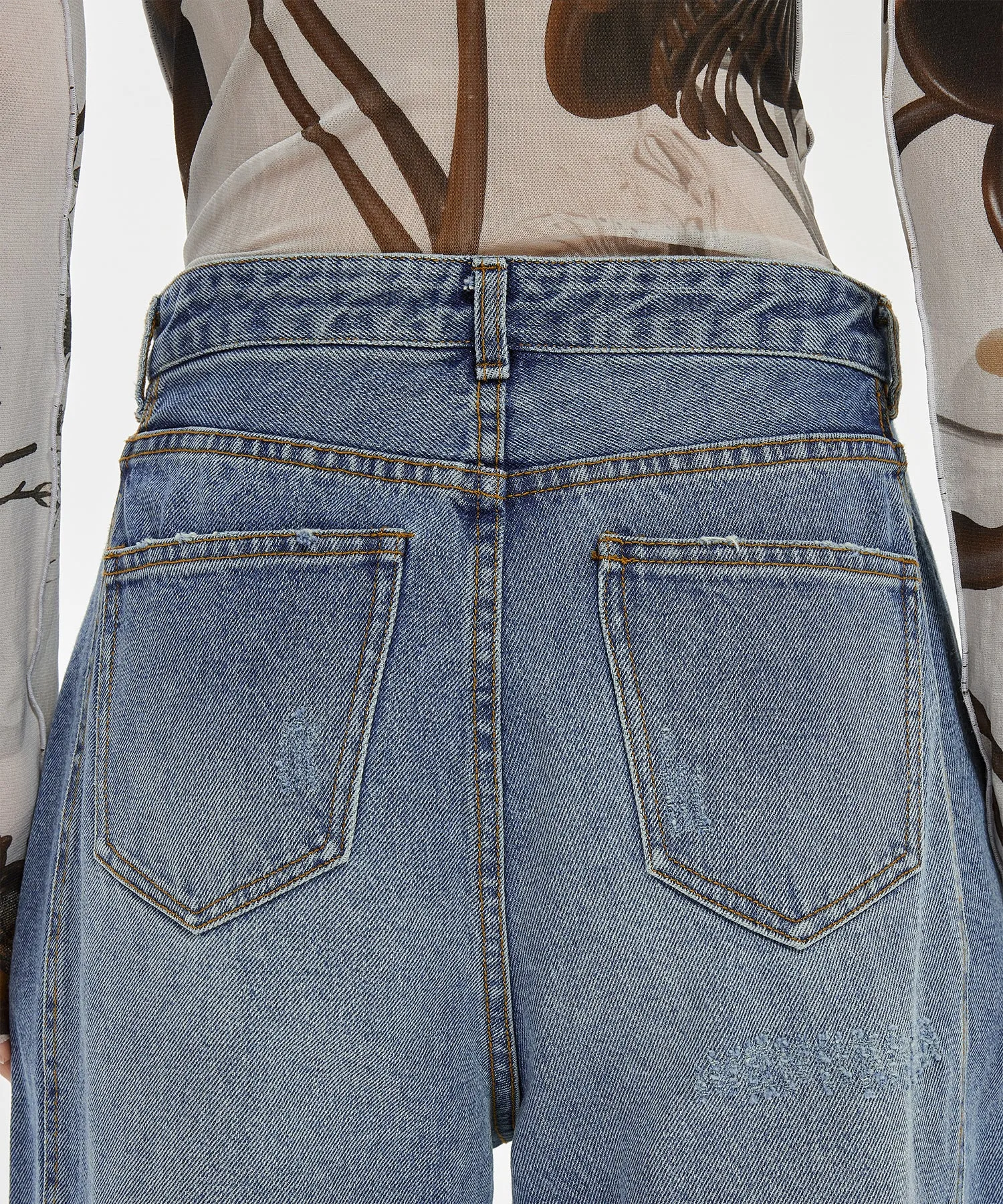 Versatile Distressed Tapered-leg Jeans